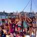 Ragazze in barca, in partenza dal porto di Monopoli, pronte per una festa